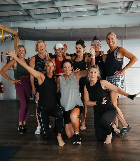A Grayton Beach Fitness group class together after a workout