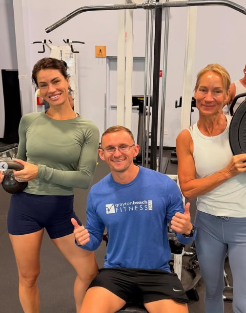 General manager and trainer Justin Scott with members during small group training at Grayton Beach Fitness